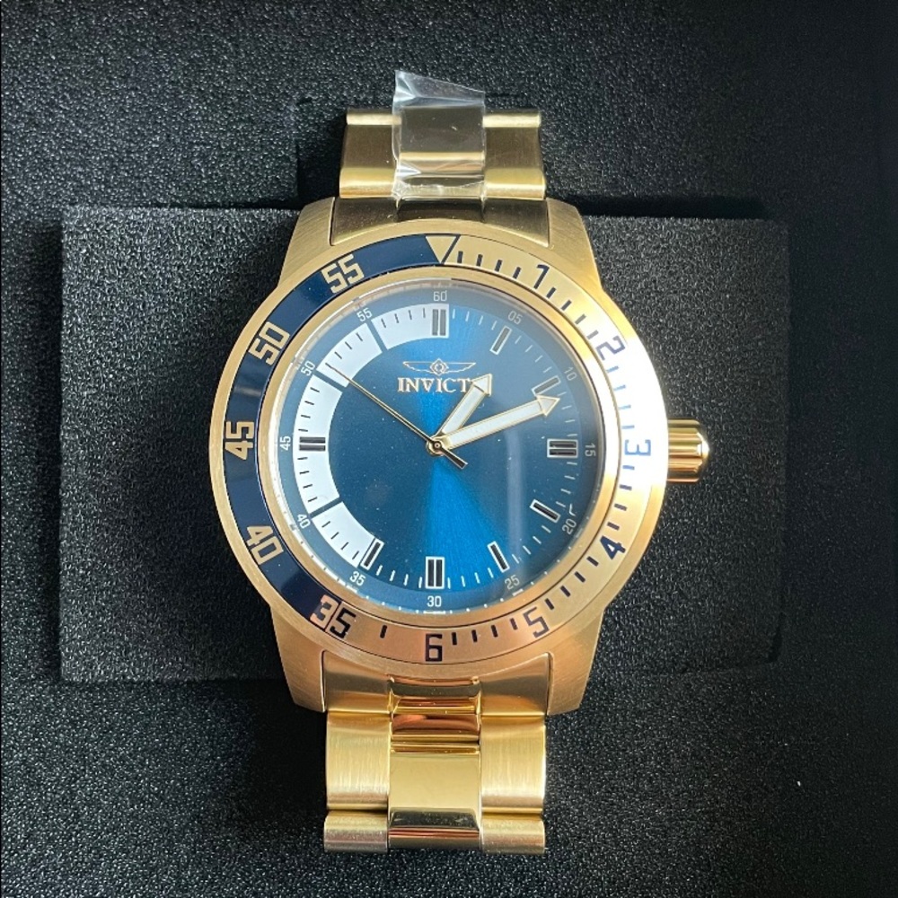 Gold and Blue Men’s Invicta Watch . New With tags in the Box